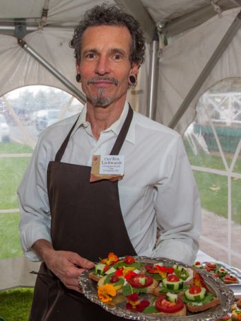 chef showing his dish at regenerative ag dinner in montana at chico hot springs